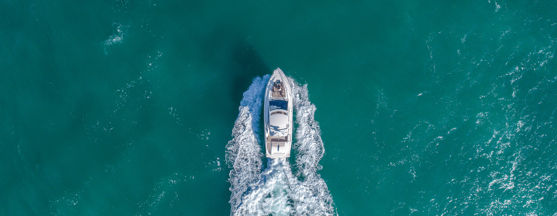lifestyle image of a boat on open waters