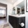 bathroom showing a tub, modern fixtures and wood-style flooring
